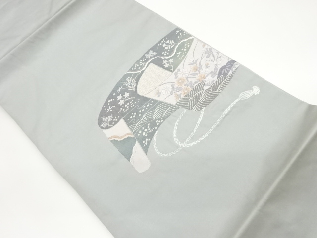 巻物に秋草模様織出し名古屋帯